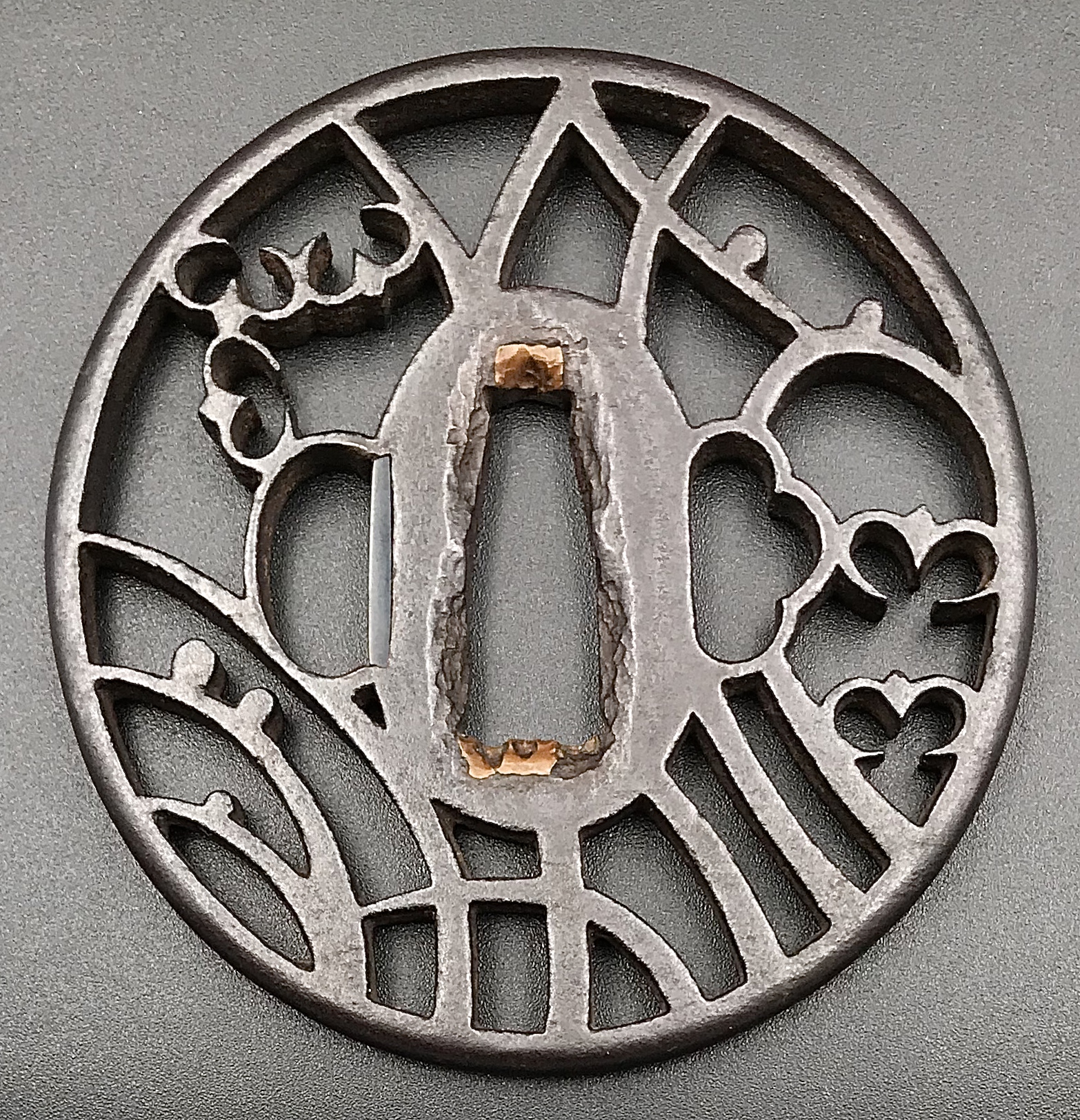 Owari tsuba with wild geese and dewdrops on pampas grass motif