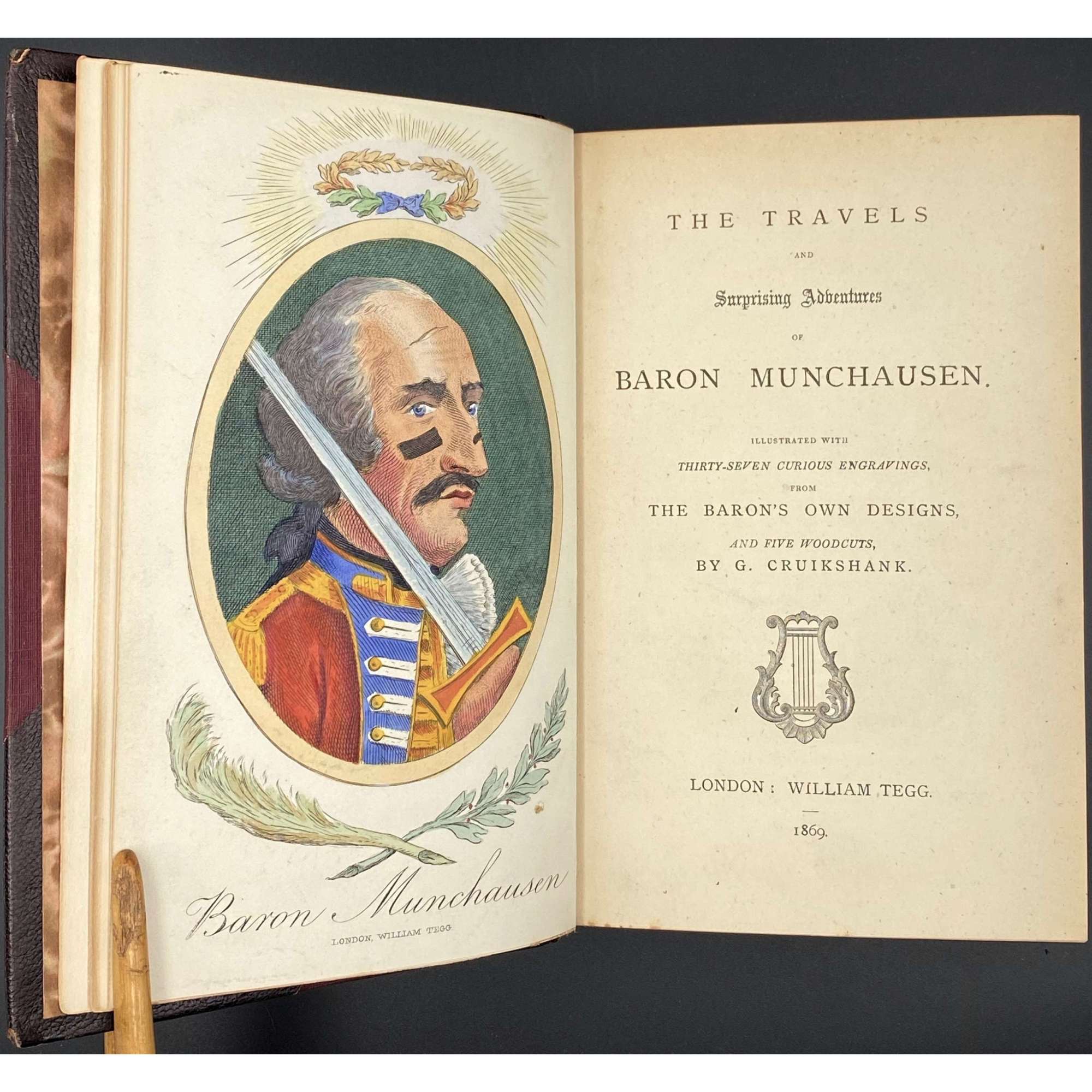 [RASPE, Rudolf Erich]. The Travels and Surprising Adventures of Baron Munchausen. / Illustrated with 37 curious engravings, from the Baron's own designs, and five woodcuts, by G. Cruikshank. — London: William Tegg, 1869. — xii + [10] + 268 pp.