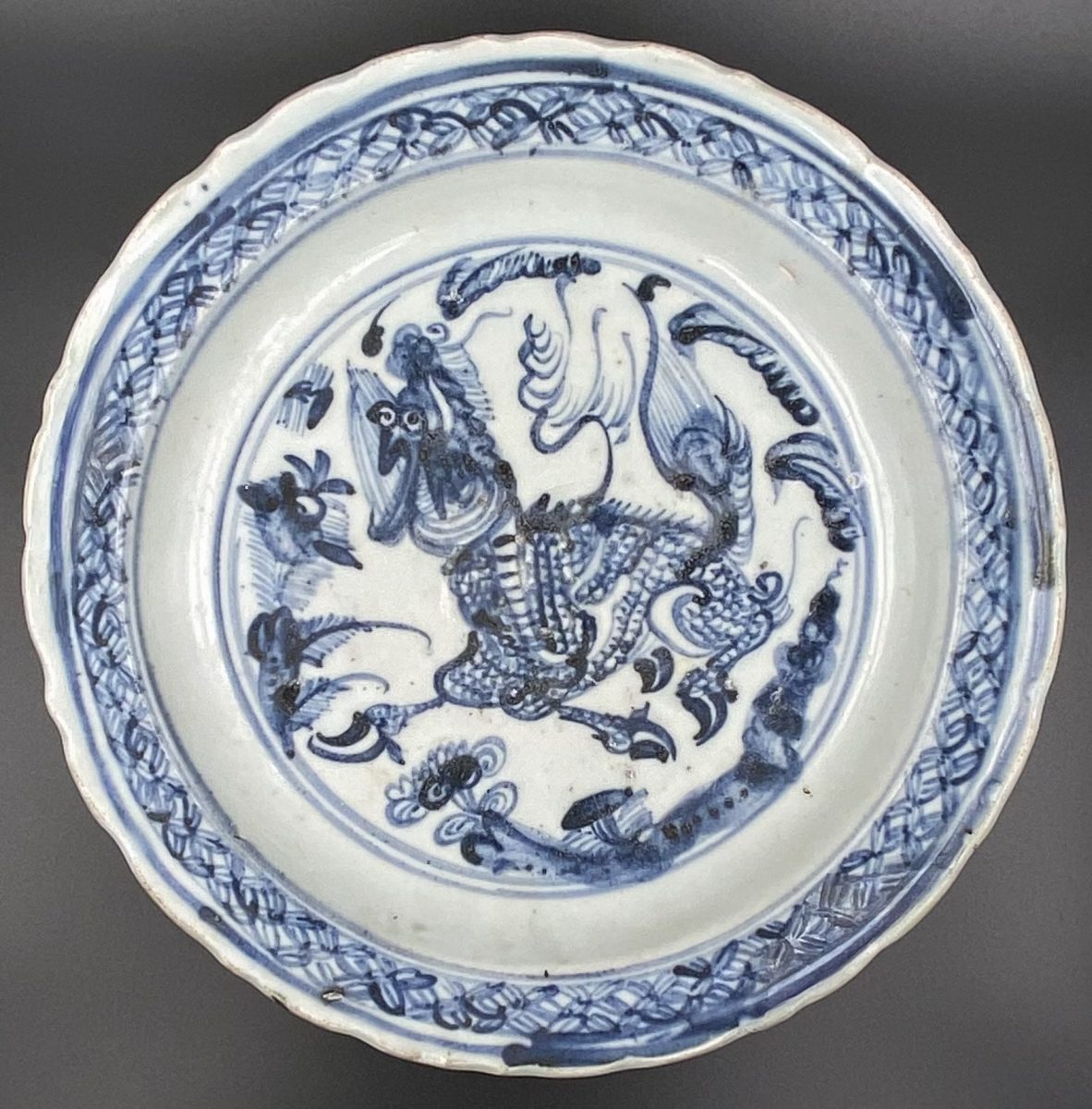 Blue and white porcelain plate with a running yak, China, Ming Dynasty ...