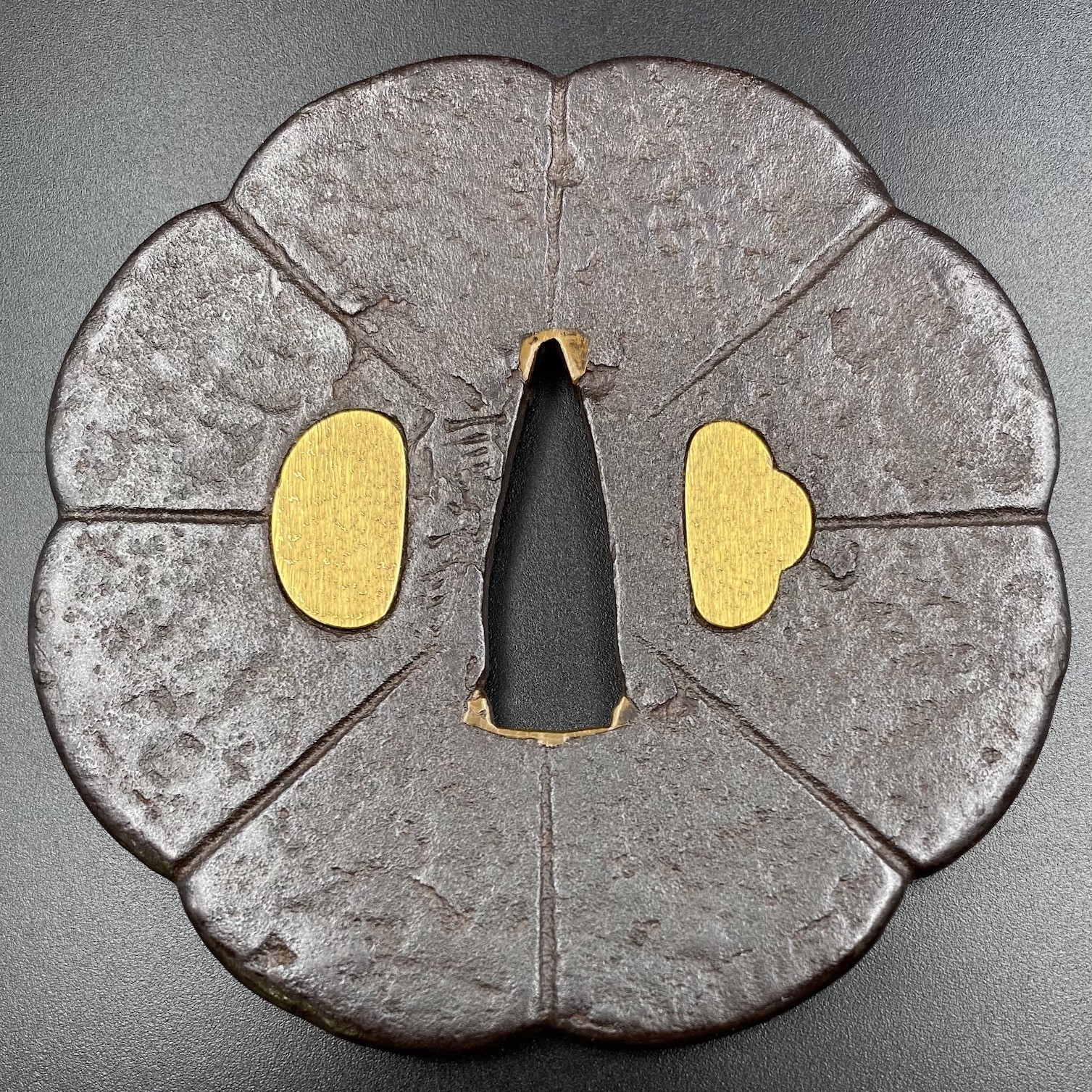 Nobuie tsuba with the eight-petalled lotus motif. Momoyama period, c. 1600.