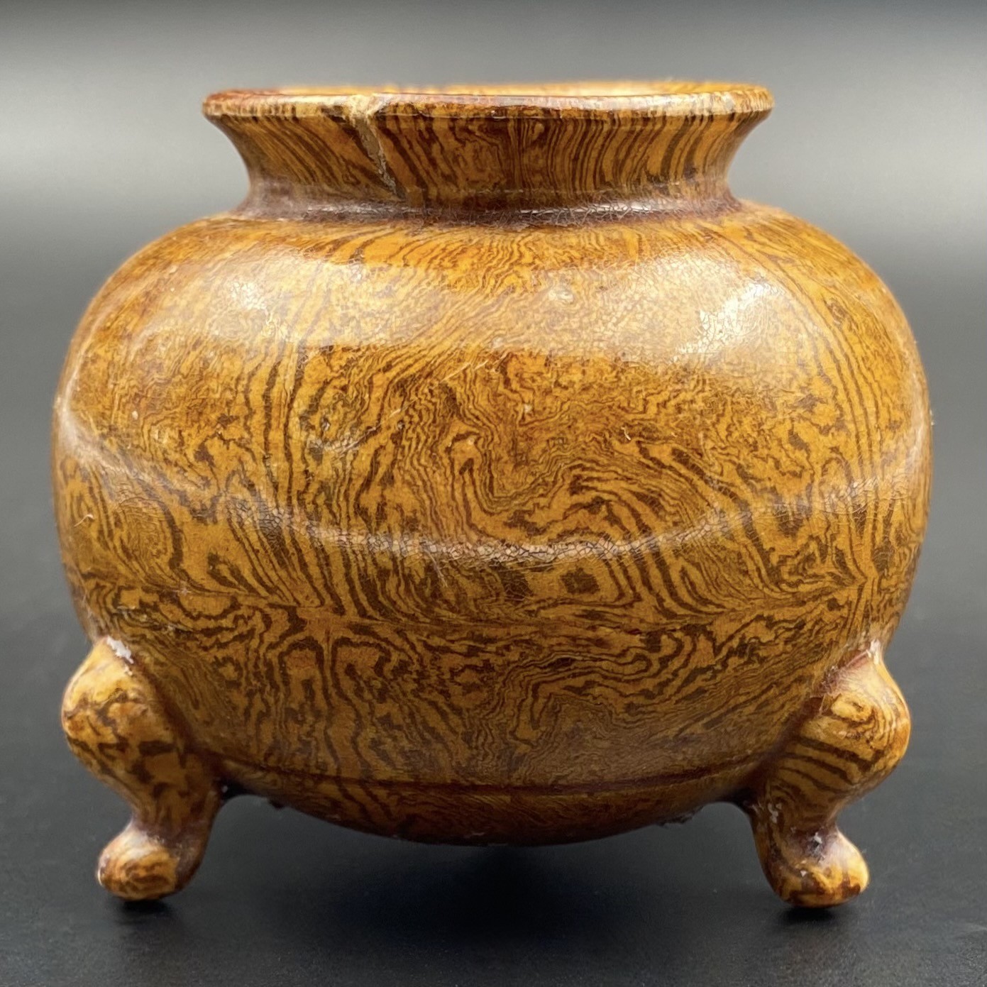 Small marbled (Jiaotai) amber glaze tripod censer. China, Tang dynasty [唐朝] (618 – 907).